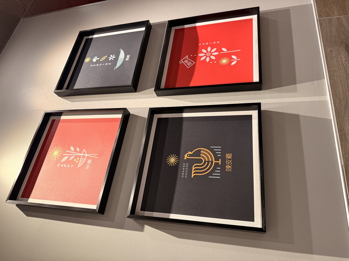 Panda Express company values wall featuring Orange Chicken